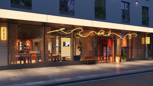 A modern hotel exterior with large glass windows, a neon sign, and a seating area outside. - Scandic Go, Saaristonkatu 1 (Oulu)