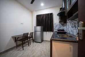 Standard Studio Suite | Private kitchen - Rayzen Stays (Chennai)