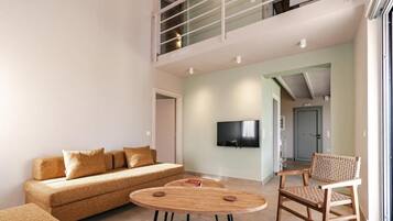 Family Suite, Pool View | Living area | Flat-screen TV