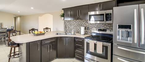 Fridge, microwave, stovetop, coffee/tea maker