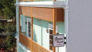 A building with a sign reading "Green Resort" and "Pondicherry." - Green Resort Pondicherry (Vanur)