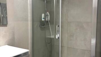 Shower, jetted tub, hair dryer, bidet