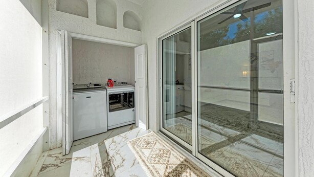 A compact kitchen with a built-in oven and a small refrigerator. - Resort style living at Warm Mineral Springs , North Port,
Florida (Venice)