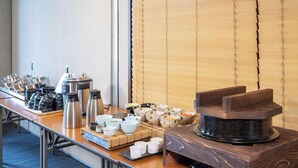 A buffet setup with various dishes and coffee stations. - APA Hotel Shonan Tsujido Ekimae (Fujisawa)