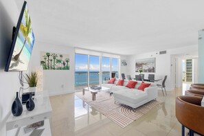 Luxury Penthouse, Ocean View | Living area | 55-inch Smart TV with cable channels - The Club Luxury Condos by Ilios Rentals (Miami)