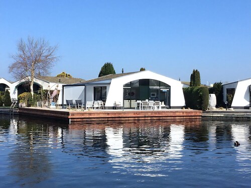 Suny bungalow with a private jetty.