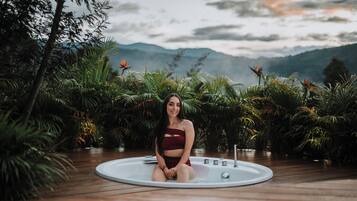 Deluxe Room, Mountain View | Outdoor spa tub
