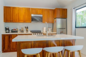 Private kitchen - 2BR, 2BA Family Home / 2 Min Drive to Coco Beach & Town / Grill & Shared Pool (Coco)