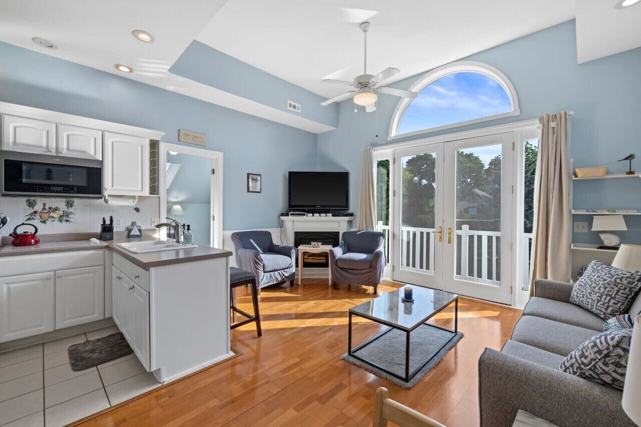 TV, fireplace, books, printers