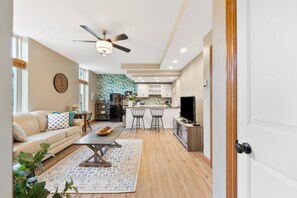 TV, fireplace, books