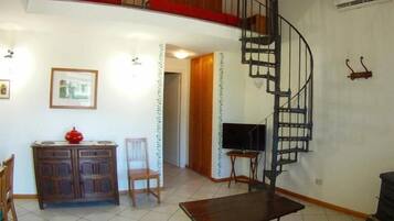 Appartement Deluxe, vue jardin | Coin séjour