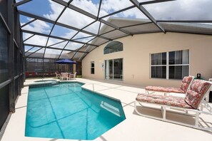 Indoor pool, a heated pool - Single-Story 4BR Home w/ Pool & Game Room (Kissimmee)