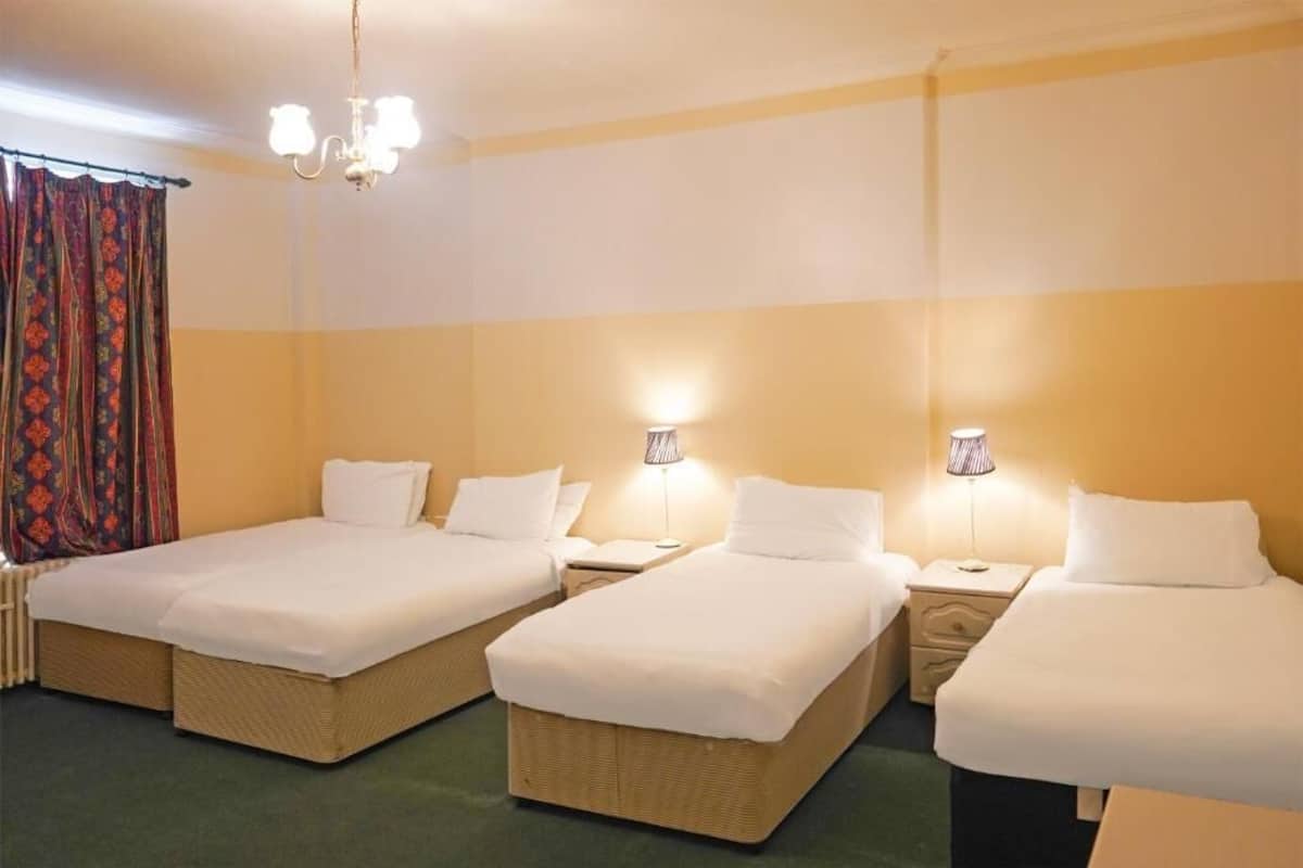 Chambre Quadruple Standard, non-fumeurs, en bord de plage | Bureau, espace de travail pour ordinateur portable, Wi-Fi gratuit