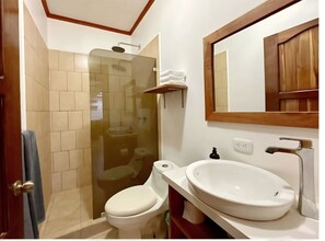 Shower, towels, toilet paper