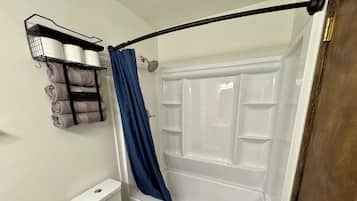 Hair dryer, towels, soap, toilet paper