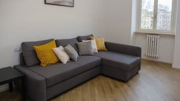 Apartment, Balcony, City View | Living area | 42-inch flat-screen TV with satellite channels, streaming services