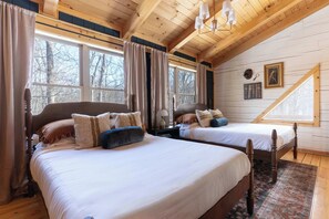 Desk, iron/ironing board, travel cot, bed sheets - The Storybook House | Hot Tub • Sauna • Theater (Logan)