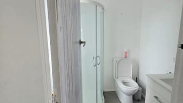 Shower, towels, soap, shampoo