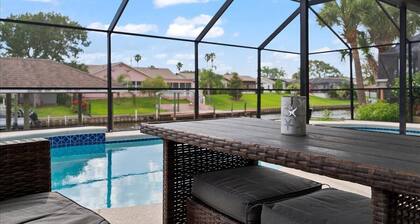 Waterfront Retreat with Pool BBQ and Canal Views