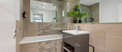 Hair dryer, towels, soap, shampoo
