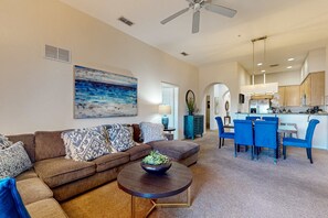 Living area - 5th floor condo w/ sauna, hot tub, shared pools, gym, balcony, near theme parks (Kissimmee)