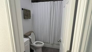 Hair dryer, towels, soap, toilet paper