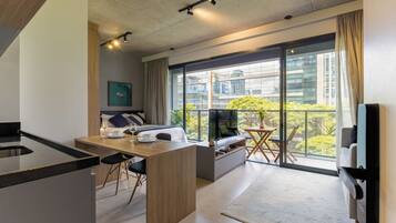 Apartamento conforto, cozinha, vista para a cidade | Área de estar