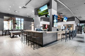 A modern bar area with a pool table, bar stools, and a counter. - 2723 Disney Universal 4BD Resort Private Spa Pool (Kissimmee)