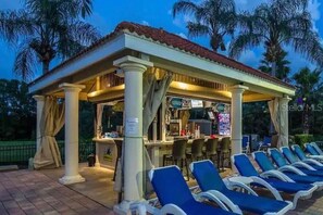 Outdoor dining - 2771 5BD Theater+Pool+Spa Game Near Disney Epic (Kissimmee)