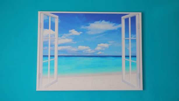 An open door leading to a beach scene with a clear sky and calm sea. - Private Villa with Garden and Vesuvius View near Sorrento Coast (Massa Lubrense)