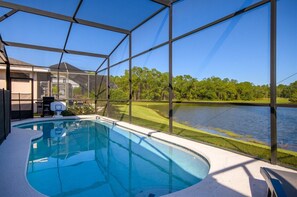 Outdoor pool, a heated pool - Disney World, Universal Epic Waterfront Modern Home - Private Pool And Game Room (Kissimmee)