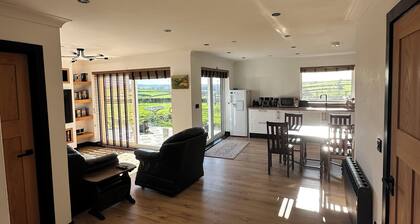 Modern accommodation with scenic views of Llansteffan.