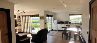 Modern accommodation with scenic views of Llansteffan.