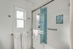 Shower, hair dryer, towels, soap