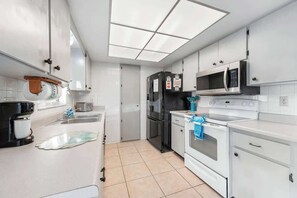 Fridge, microwave, oven, stovetop - Beach Days & Pool Nights | 3BR Home Near AMI (Bradenton)