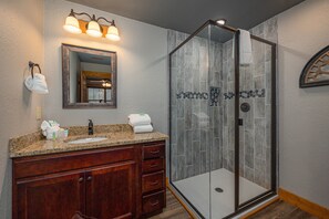 Shower, jetted bath, hair dryer, towels - Mountain Sunrise Pool Cottage • Luxury 4BR Chalet w/ Indoor Pool, Game Room (Gatlinburg)
