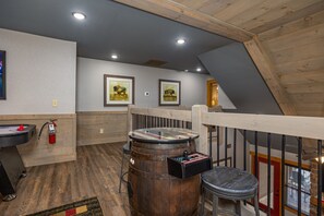 Games room - Mountain Sunrise Pool Cottage • Luxury 4BR Chalet w/ Indoor Pool, Game Room (Gatlinburg)
