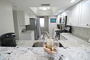 Fridge, microwave, oven, stovetop - Barefoot Trace 409 Direct Oceanfront with Private Balcony Overlooking St. Augustine Beach (St. Augustine)