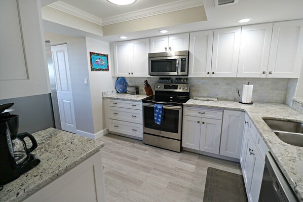 Fridge, microwave, oven, stovetop - Barefoot Trace 409 Direct Oceanfront with Private Balcony Overlooking St. Augustine Beach (St. Augustine)
