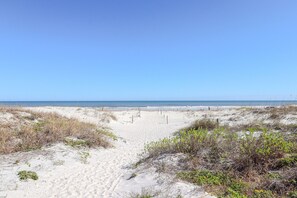 A sandy beach with dunes and sparse vegetation. - Remodeled Luxury Condo at Spanish Trace 238 (St. Augustine)