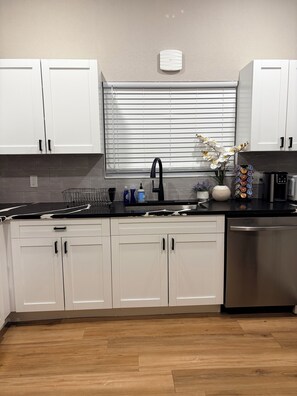 Fridge, microwave, oven, stovetop - Modern 2BR Near Ybor Free Parking + Washer/Dryer + Full Kitchen (Tampa)