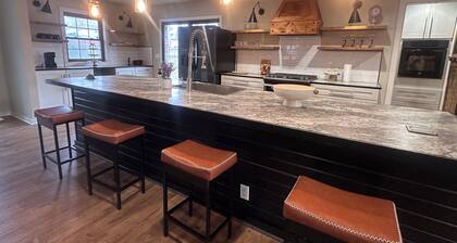The Never Evergreen House — open-concept near The Pioneer Woman Merchantile