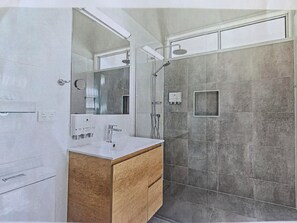 Regadera, toallas, jabón, papel de baño