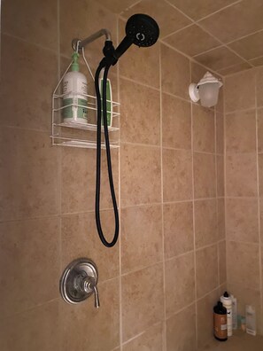 Shower, jetted tub, towels, soap