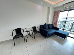 Deluxe suite, 2 slaapkamers | Woonruimte