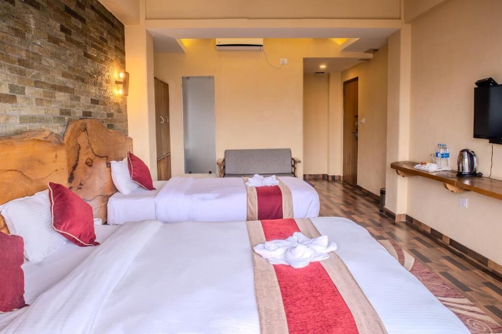 Deluxe Double Room, Garden View | Desk, laptop workspace, free WiFi