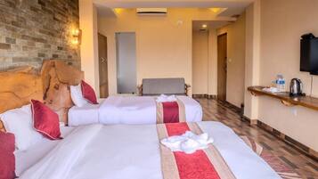 Deluxe Double Room, Garden View | Desk, laptop workspace, free WiFi