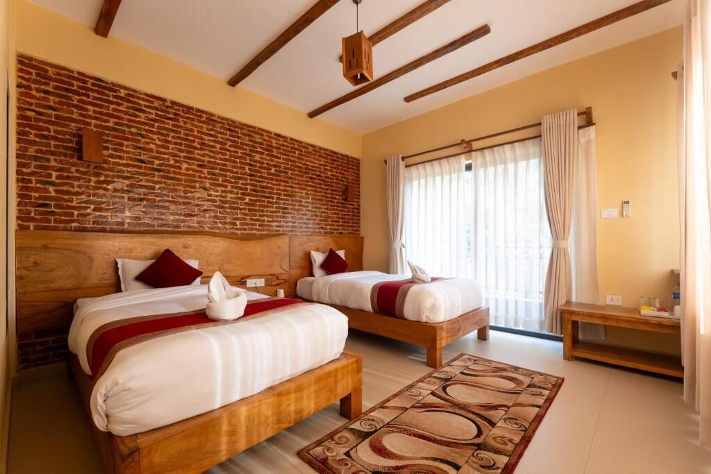 Deluxe Double Room, Garden View | Desk, laptop workspace, free WiFi