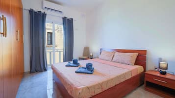 Apartment, City View | Blackout curtains, iron/ironing board, free WiFi