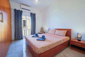 Apartamento, vista para a cidade | Cortinas blackout, ferros/tábuas de passar roupa, Wi-Fi de cortesia